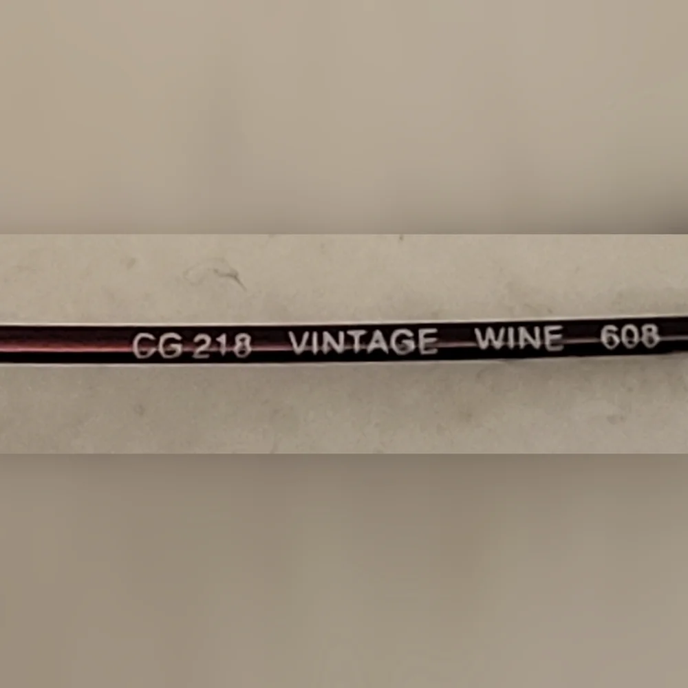 Covergirl wire frame eye glasses,  vintage wine color